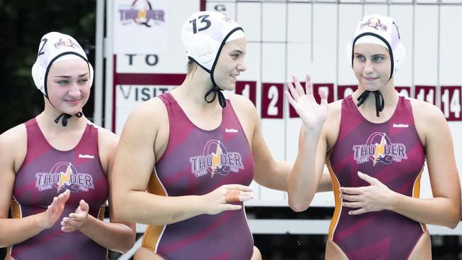 Molly Nasser, Tenealle Fasala and Alice Campbell prior to a recent Queensland Thunder game. (AAP Image/Richard Walker)