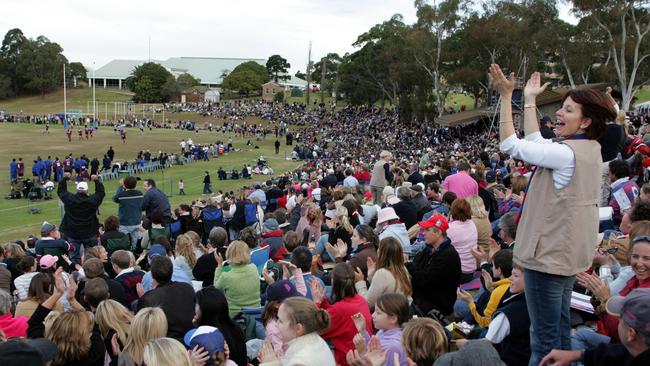 Joeys fans in the crowd celebrate the team's first try during a St Ignatius College Riverview vs St Joseph's College 1st XV's GPS match at Riverview, Sydney. 