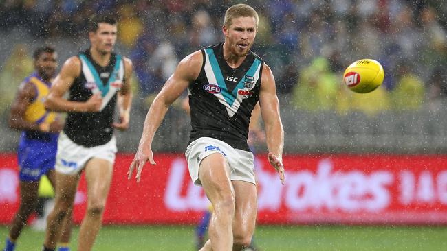 Tom Clurey of the Power passes the ball during the round 5 AFL match against West Coast. Picture: Getty Images