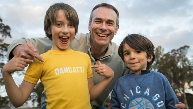 Rangeville State School Year 2 student Diego Ryan wears the school house shirt for Dangatti that was made for his father Jason Ryan to wear in the early 80's, also pictured is his brother Marco, as the history and stories of the school are collated. Picture: Kevin Farmer