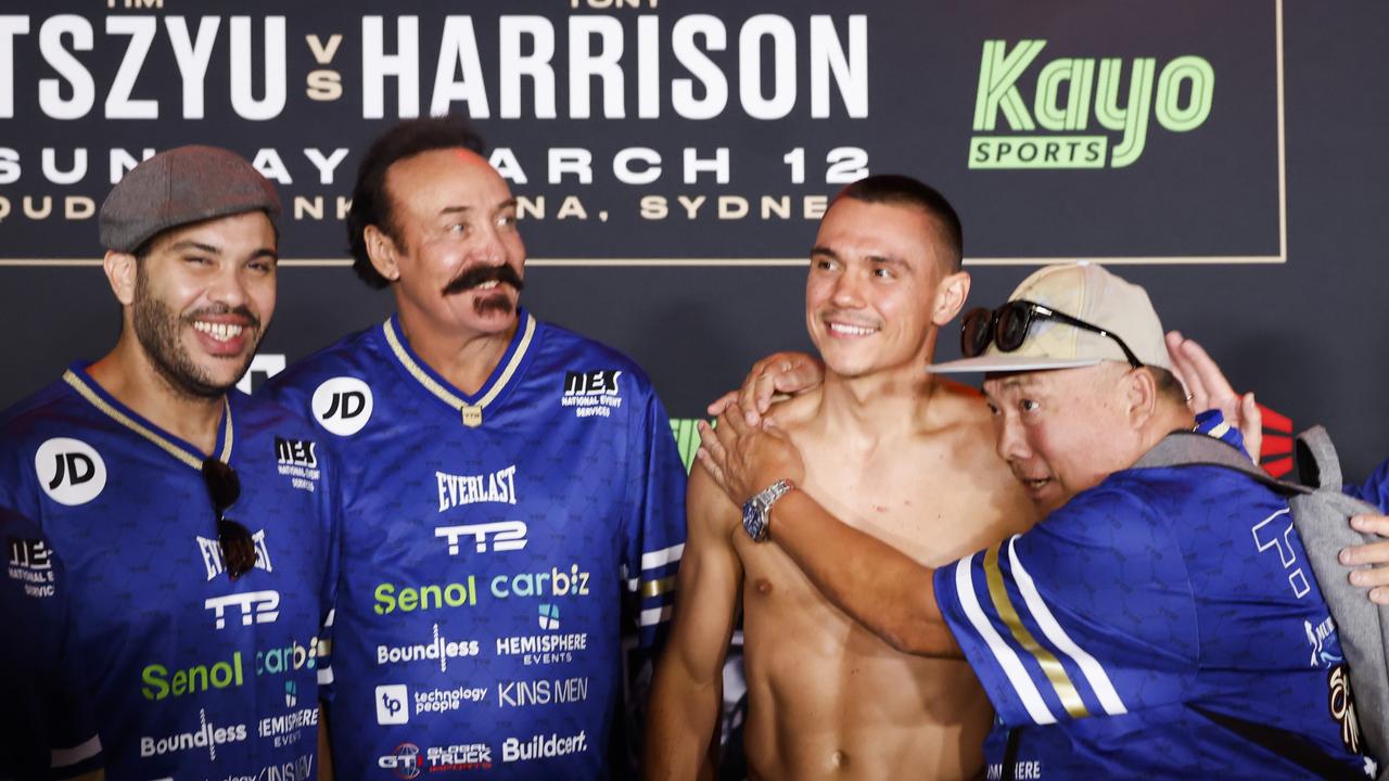 Tim Tszyu gets a hug during the official weigh-in.