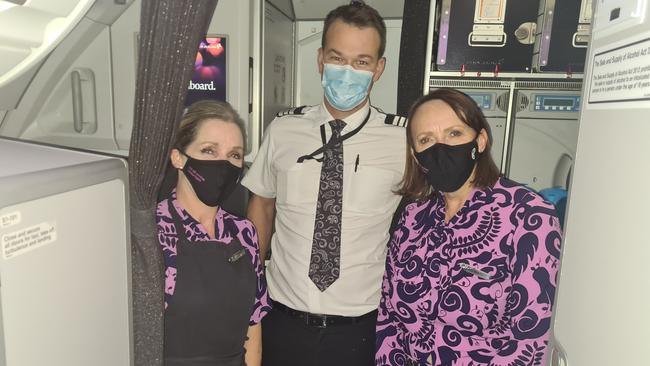 First officer Greg Ovens with flight attendants Julia Broadley-Ryan (left) and Mandy May on board the Air NZ flight from Adelaide Airport.