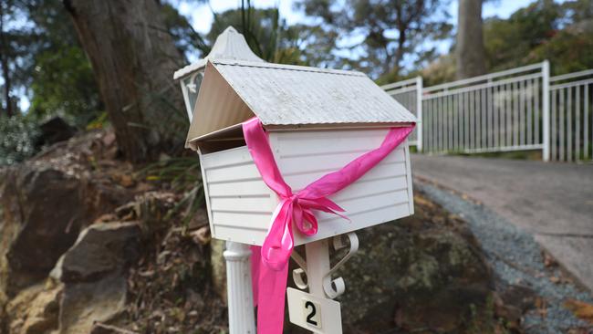 Pink ribbons have been tied to the letterbox of the former Dawson home at Bayview in the wake of this week’s murder verdict. Pink was Lynette’s favourite colour. Picture: John Grainger