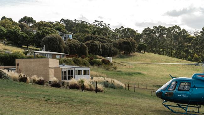 A helicopter arrives at Van Bone restaurant in Marion Bay. Picture: Jonno Rodd.