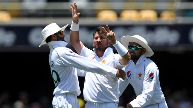 Yasir Shah gestures to Steve Smith after taking the Australian star’s wicket. Picture: Getty