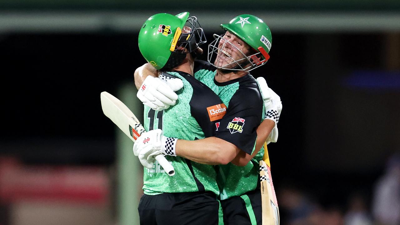 Hilton Cartwright and Jono Merlo celebrate the Melbourne Stars’ first win of the season. (Photo by Brendon Thorne/Getty Images)
