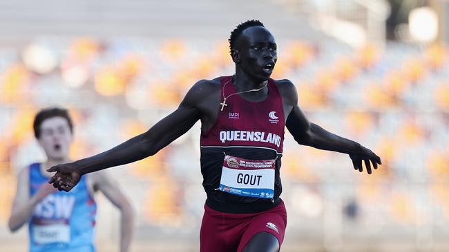 BRISBANE, AUSTRALIA - DECEMBER 07: Gout Gout of Queensland wins the final of the Boys' U18 200m in a National Record time of 20.04 seconds during the 2024 Chemist Warehouse Australian All Schools Athletics Championship at Queensland Sport and Athletics Centre on December 07, 2024 in Brisbane, Australia. (Photo by Cameron Spencer/Getty Images)