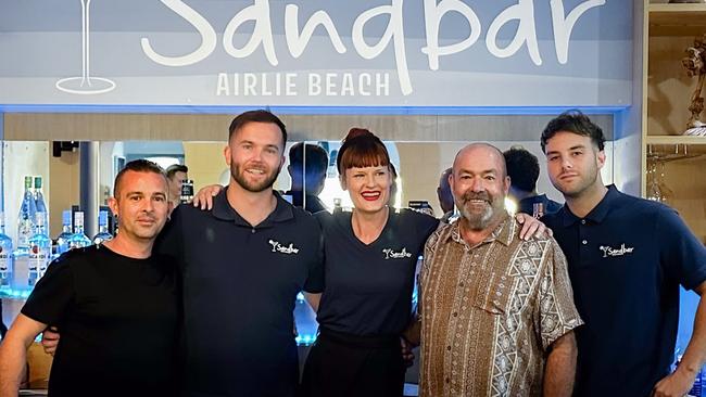 Sandbar owner Paul Atkins, with barman Niall Carr and star waitress Phoebe Jacobs, and chef Christos Rallis. Picture: Sandbar