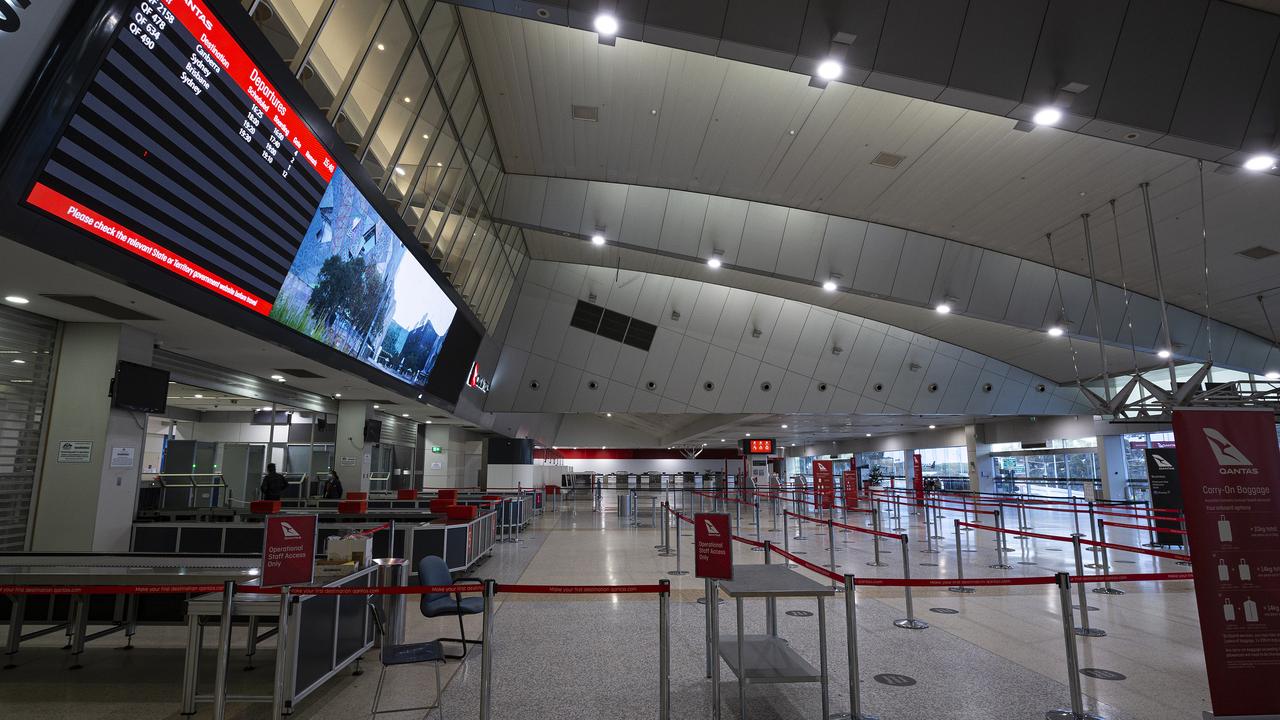 The empty Qantas domestic terminal at Melbourne Airport on Tuesday. Picture: Daniel Pockett/Getty Images