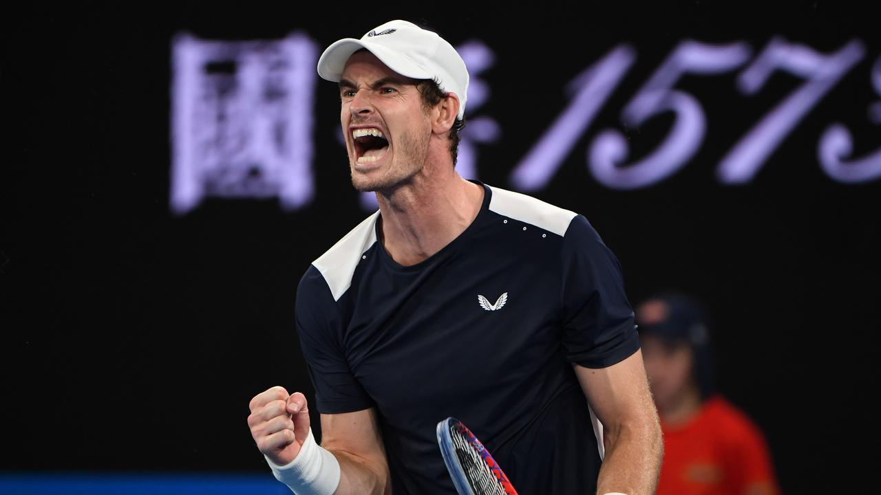 Murray reacts after winning the fourth set.