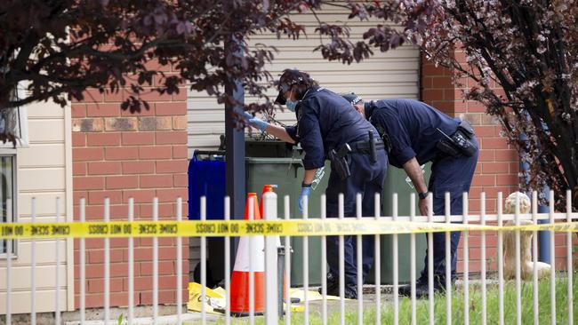 Major Crime officers at the murder scene on Wednesday. Picture: Brett Hartwig