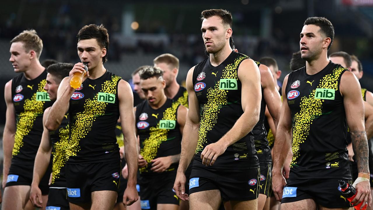 The Tigers look dejected after losing to Melbourne. Picture: Quinn Rooney/Getty Images