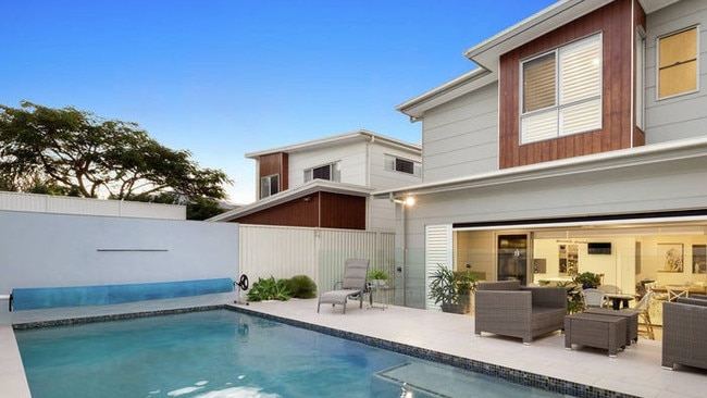 A relaxing outdoor entertainment area is a feature of 165 Macrossan Ave, Norman Park.