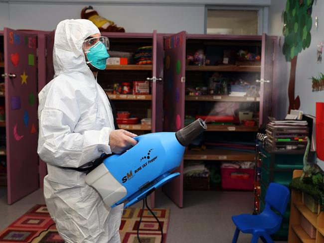 A specialised COVID-19 cleaning team from national cleaning company Cleancorp sterilises the Kids Learning Academy Childcare and Preschool in Busby as NSW records 14 new cases. Picture: Dylan Coker/NCA NewsWire