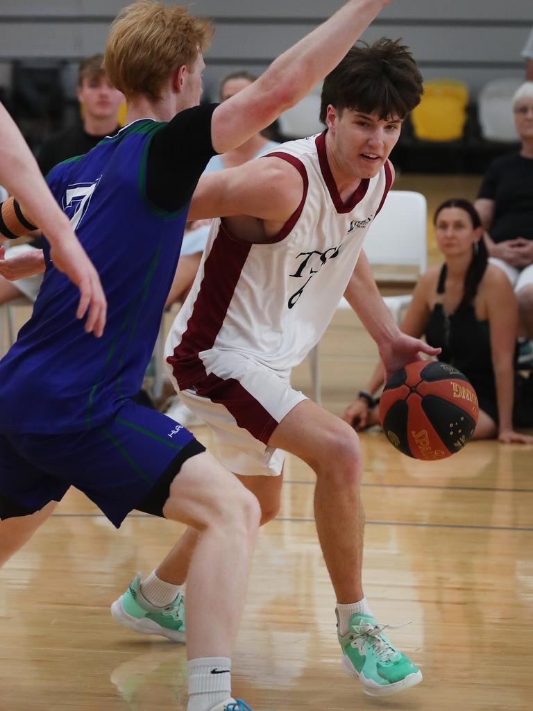 Basketball Australia Schools Championships at Carrara. Mens open final, Lake Ginninderra College Lakers V TSS (in white). the Lakers defence gave Benjamin Tweedy from TSS special attention in the final. Picture Glenn Hampson