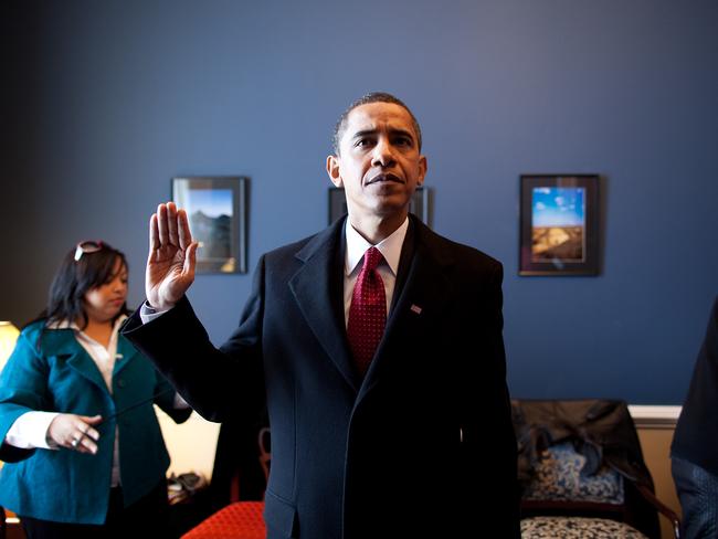 Then President-elect Obama practices how he will hold his hand during the swearing in at the US Capitol on January 20, 2009. Picture: Pete Souza/The White House