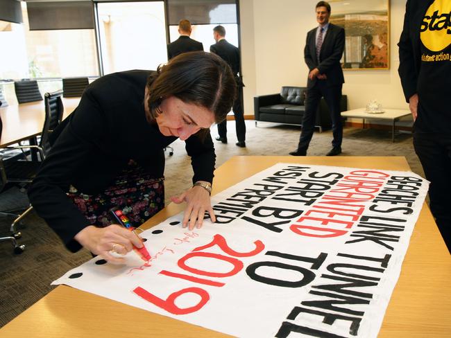 Premier Gladys Berejiklian previously signs a community pledge to start work on the Beaches Link in 2019.