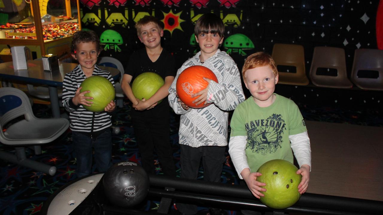 BOWLING: Tyler Bougoure, Bryan Whitaker, Bailey Bell and Jacob Leigh opt to bowl instead of dance at the junior Blue Light Disco on Friday night. Photo Linden Morris / Stanthorpe Border Post