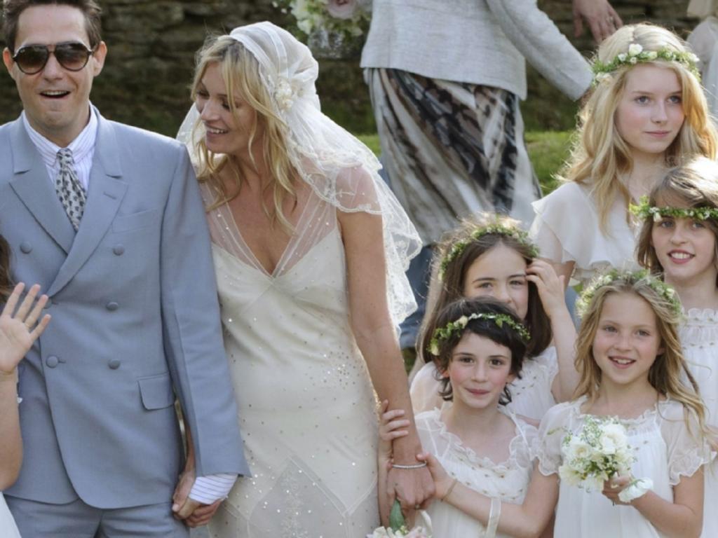 Lottie (top right) was scouted at sister Kate’s wedding in 2011.