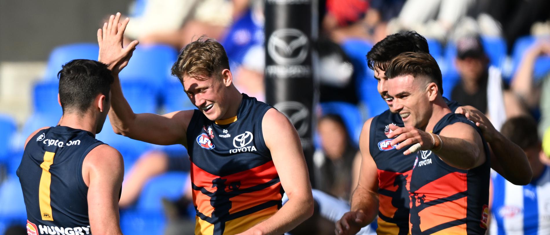 HOBART, AUSTRALIA - APRIL 27: Brayden Cook of the Crows celebrates a goal  during the round seven AFL match between North Melbourne Kangaroos and Adelaide Crows at Blundstone Arena, on April 27, 2024, in Hobart, Australia. (Photo by Steve Bell/Getty Images)