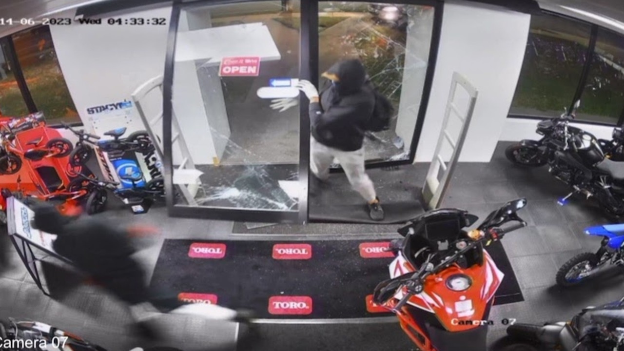 The offenders captured on Gladstone Motorcycles CCTV.