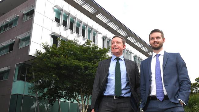 Christian Sandstrom and Matt Barker in front of the office building they sold to UQ at 74 High St, Toowong. Picture: AAP image/John Gass