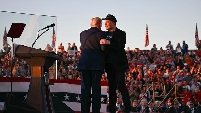 Tesla CEO Elon Musk joins Republican presidential candidate Donald Trump on stage at a campaign rally in Butler, Pennsylvania on October 5. Picture: Jim Watson/AFP