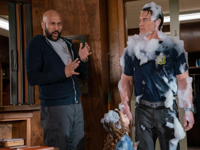 Keegan-Michael Key, Finley Rose Slater, and John Cena in Playing With Fire.