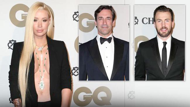 Iggy goes risque in plunging outfit as Jon Hamm and Chris Evans show ...