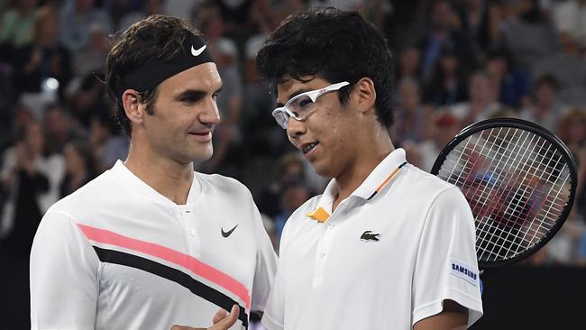 Roger Federer and Hyeon Chung after the Korean retired injured.