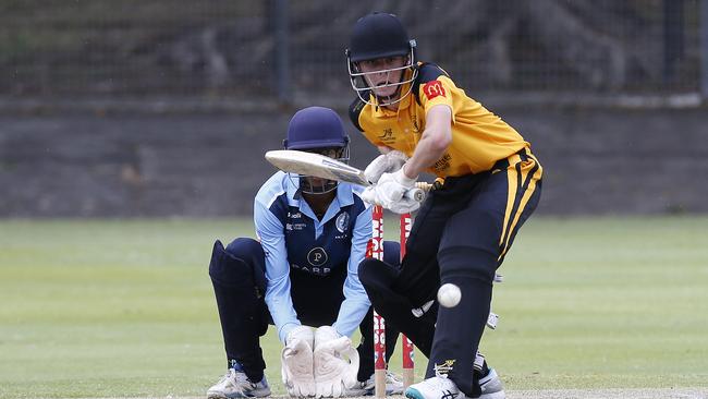 Parramatta keeper Adbith Boreddy and Blacktown's Jett Saxby. Green Shield Cricket Round 2. Parramatta (two tone blue) v Blacktown Mounties (gold and black) at Merrylands Oval , Merrylands. Picture: John Appleyard