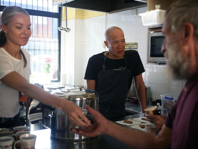 Dr Teo and Ms Griffiths were photographed for The Saturday Telegraph while volunteering at the Wesley Community Centre in Wollongong as they have done for years. Picture: Jeff Darmanin