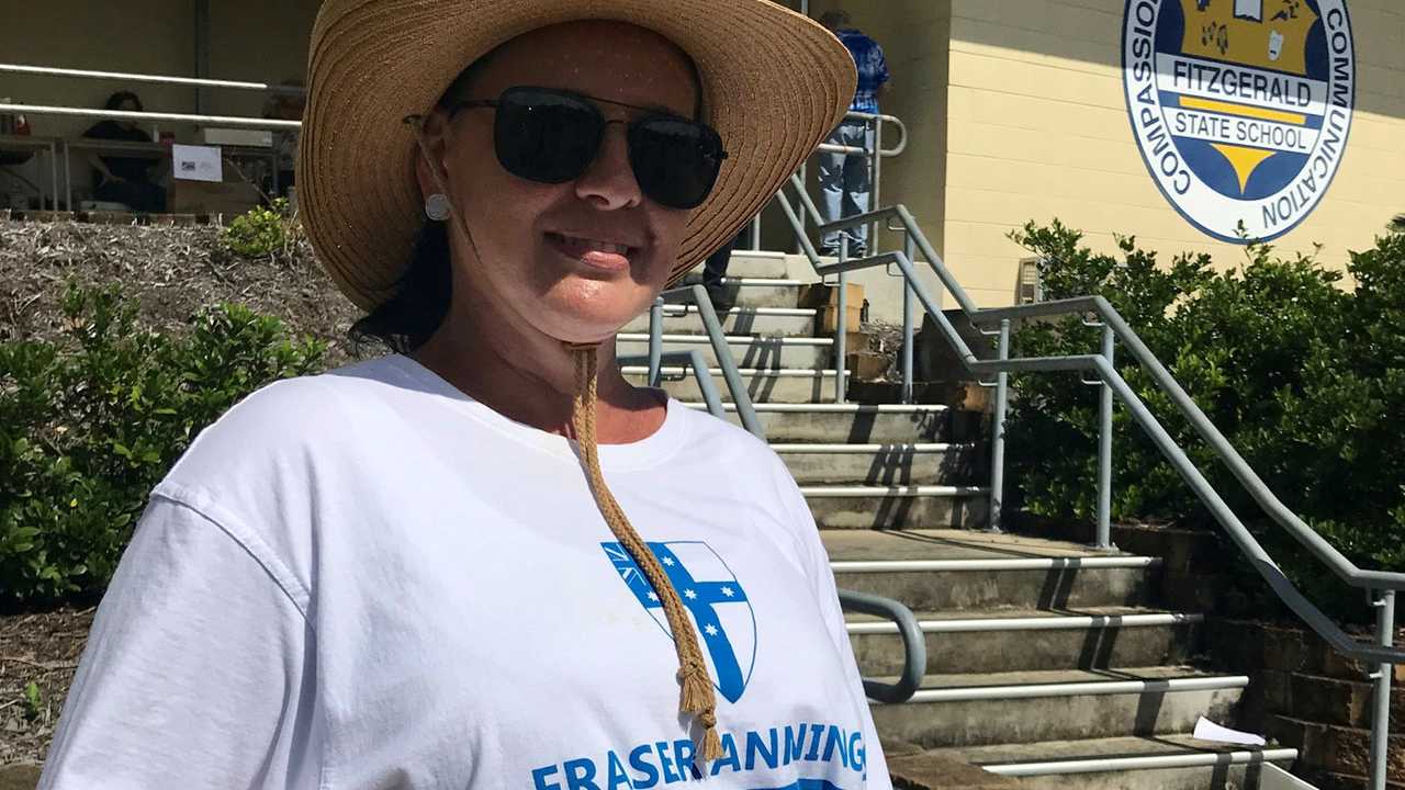 Carmel Delaney doggedly spoke to voters as they entered the polls at Fitzgerald State School polling station. Picture: Angela Seng