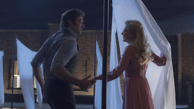 Hugh Jackman is really giving Michelle Williams the sheets in this scene from "The Greatest Showman."