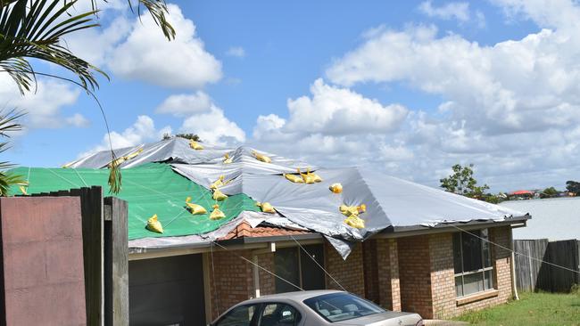 Houses damaged on Jezabel Drive, Springfield Lakes.