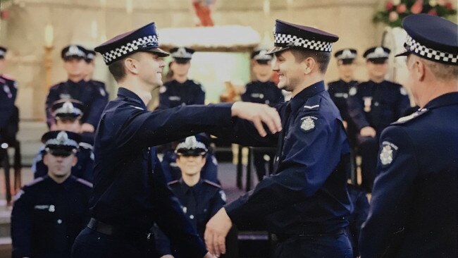 Constable Josh Prestney with his brother Alex at his police academy graduation in December