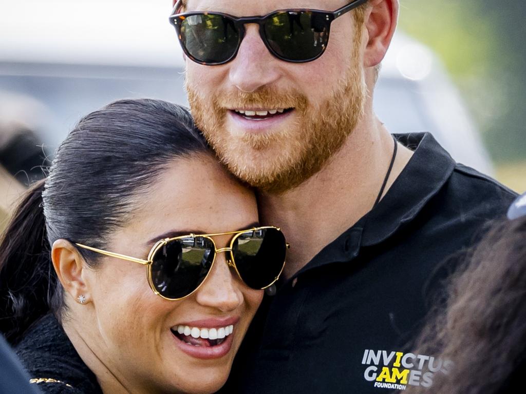 Harry said he and wife Meghan smother their kids. (Photo by ANP via Getty Images)