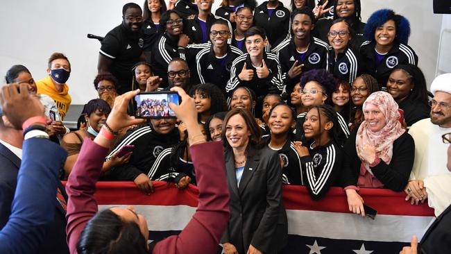 US Vice President Kamala Harris poses with members of the Detroit Youth Choir after delivering remarks at a vaccine mobilisation event at the TCF Center in Detroit. Picture: AFP