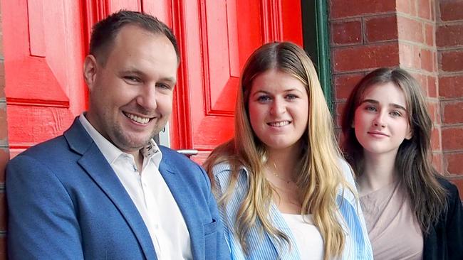 Catherine McAuley College principal Brian Turner pictured with 2023 dux proximus Maggie Keating and college dux Tess Rule. Picture: Contributed.