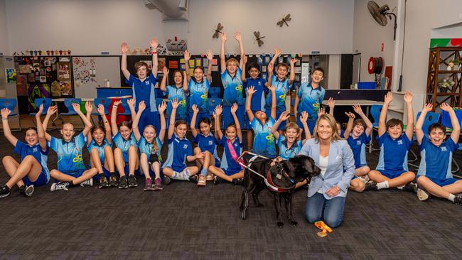 2x Paralympian and gold-medallist Katie Kelly OAM spoke to students from Stuart Park Primary with her guide dog Guthrie. Picture: Pema Tamang Pakhrin.