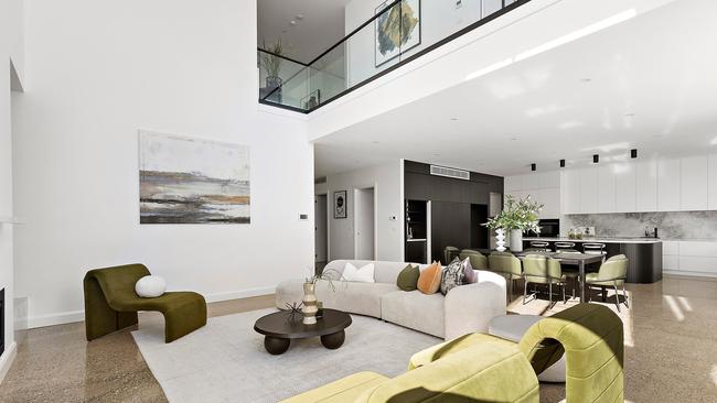 This grand open-plan living area is the heart of the home.