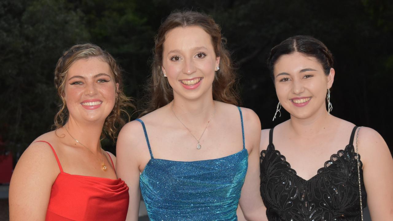 Kayla Hughes-Roberts, Emma Willis and Grace Miotto at the Year 11 Good Shepherd formal, 2022.