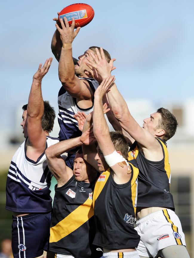 Cameron Cloke takes a hanger in the 2011 Division 1 grand final.