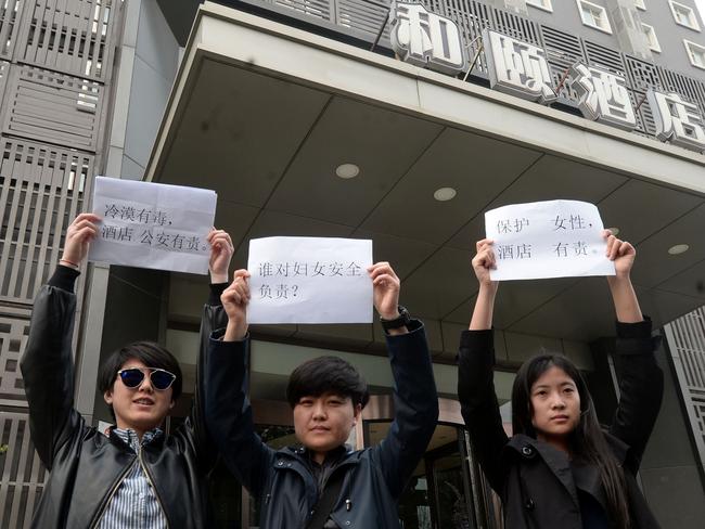 Protesters have rallied outside the Yitel hotel in Beijing demanding more protection for women. Picture: AFP / STR