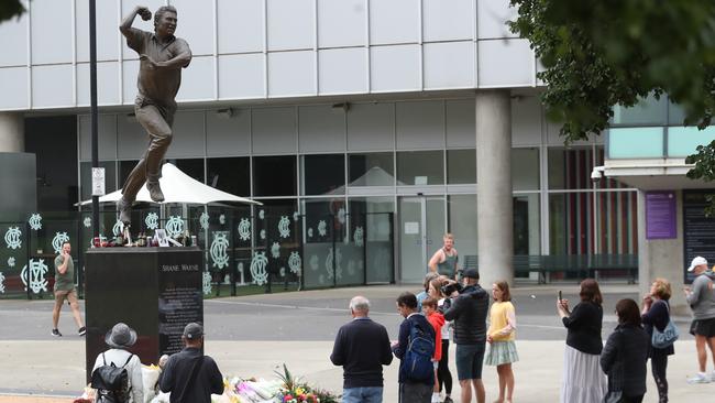 Warne’s statue at the MCG has turned into a memorial. Photo: NCA NewsWire / David Crosling