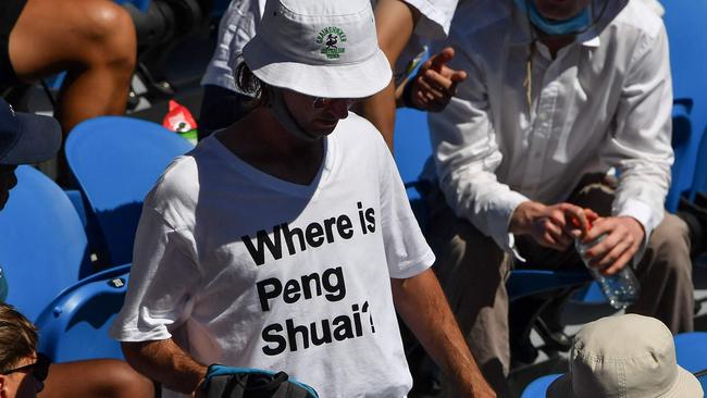 A spectator wears a "Where is Peng Shuai?" T-shirt at Melbourne Park on Tuesday. Picture: AFP