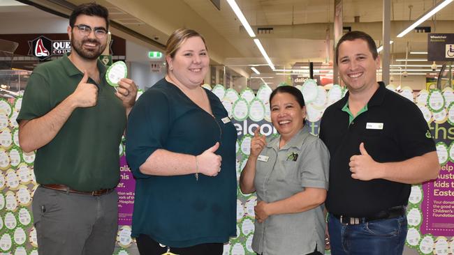 Roma Woolworths store manager Tony Marris (right) with staff members Jordan, Fiona and Belle. Picture: Chloe Cufflin.