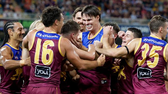 BRISBANE, AUSTRALIA - MAY 05: Logan Morris of the Lions celebrates a goal during the 2024 AFL Round 08 match between the Brisbane Lions and the Gold Coast SUNS at The Gabba on May 05, 2024 in Brisbane, Australia. (Photo by Russell Freeman/AFL Photos via Getty Images)