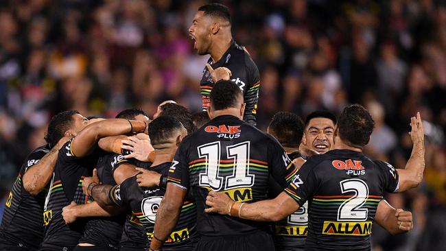 Wests Tigers players celebrate the win. Picture: AAP 