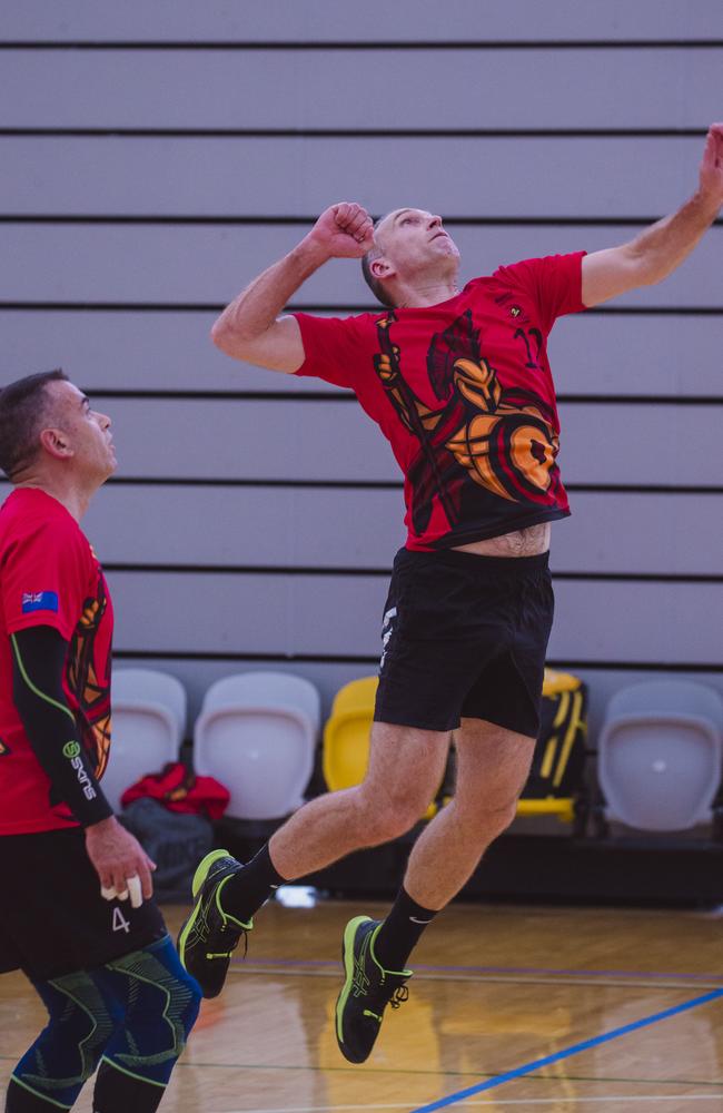 Action as Sparta v the Crippled Wombats in the Pan Pacific Masters Games Volleyball tournament. Picture: Glenn Campbell